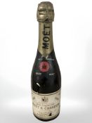 A bottle of Moet & Chandon dry imperial champagne 1947.