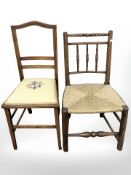 An oak and rattan chair, and another occasional chair.
