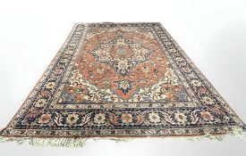A 20th century carpet of Heriz design,