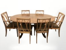 A G Plan teak extending oval dining table with internal leaf,