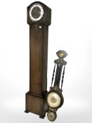 An Art Deco oak grandmother clock, height 135 cm, together with a barometer.