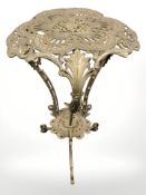 An ornate cast brass plant stand, height 75 cm.