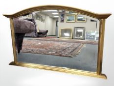 A contemporary bevelled over mantel mirror, 77 cm x 123 cm.