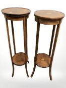 An Edwardian mahogany and satinwood inlaid circular plant stand and a further walnut example,