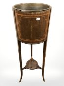 An Edwardian inlaid mahogany jardiniere stand, height 97cm.