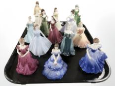 Thirteen Coalport porcelain ladies.