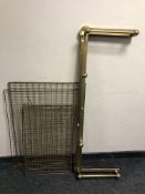 A brass fire curb and a pet cage