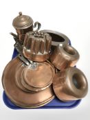 A group of copper jelly moulds, skillets, coffee percolator, etc.