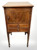 An Edwardian mahogany pot cupboard,