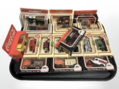 Boxed die cast delivery wagons and cars including Lledo and Coca Cola.