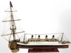 A scale model of the Titanic, length 80 cm, and a further cross section model of HMS Victory.