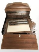A small Chippendale style mirror and a parquetry caddy.