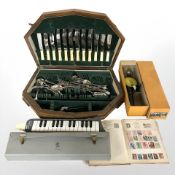 A canteen of stainless steel cutlery, Stanley hand drill,