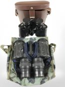 A pair of Carl Zeiss 8x30 binoculars and further pair of Russian 7x30 binoculars.