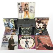 A case of 70s/80s vinyl LP records including ABBA. Cliff Richard and other mixed artists.