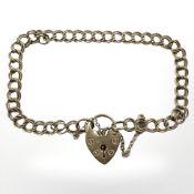 A 9ct yellow gold bracelet with padlock clasp CONDITION REPORT: 7g.