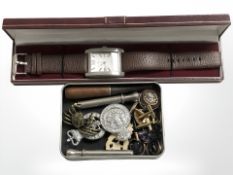 A small tray containing police badges, cheroot, 9ct gold 'front and back' tie clip with cufflinks,