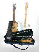 A violin, Kay acoustic guitar,