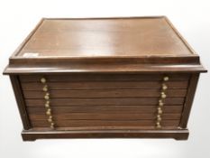 A mahogany six-drawer coin collector's cabinet, width 52cm.