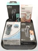 Four boxed lady's/gents shavers including Remington, Braun and Wahl.