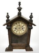 A HAC mantel clock striking on a gong,