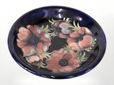 A Moorcroft Anemone shallow dish, diameter 22 cm.