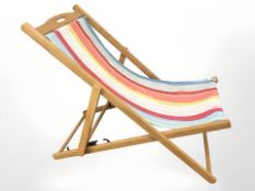 A folding deck chair.