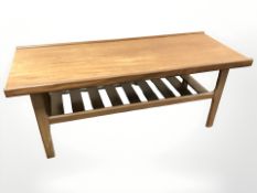 20th century teak rectangular coffee table, with undershelf, length 111 cm.