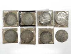 A group of seven Chinese coins and further Queen Elizabeth II crown.