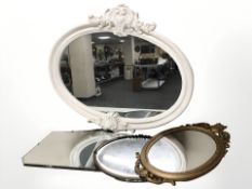 A painted oval wall mirror,