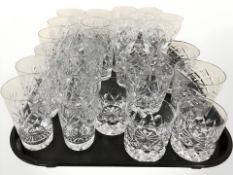 A group of crystal whiskey tumblers, wine glasses,