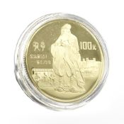 A Chinese 0.917 gold coin, 100 Yuan 1985. CONDITION REPORT: 11.2g.