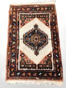 Two Iranian / Afghan rugs, largest 100 cm x 62 cm.