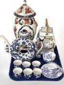 A reproduction Chinese porcelain ring-shaped teapot, similar porcelain vase on stand,
