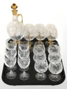 A two-tone etched amber glass decanter and six matching glasses,