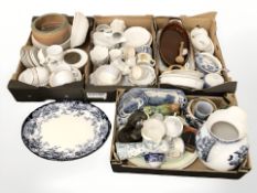 A large quantity of tea and dinner wares, resin figure of a blacksmith, blue and white ceramics,