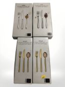 Four John Lewis cutlery sets.