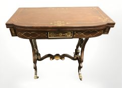 A Regency rosewood and brass inlaid card table, width 91 cm.