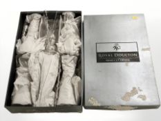 A boxed set of six Royal Doulton crystal champagne flutes, height 20 cm.