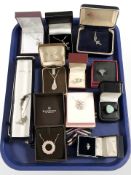 A group of silver jewellery including crucifix and other pendants, dress rings,