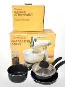 A boxed Sunbeam MX100 mixer, further attachment and three pans.