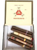 A Monte Cristo Habana cigar box containing a quantity of cigars