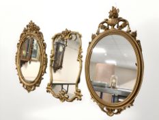 Three ornate reproduction gilt framed mirrors,