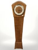 A Smith's Art Deco oak granddaughter clock, height 132 cm.