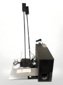 A Bose powered Acoustimass 20 speaker system, pair of Bose speakers on stands,