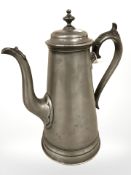 A 19th century pewter coffee pot, height 26 cm.