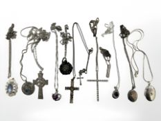 Eleven silver and white metal chains with pendants, Crucifix etc.