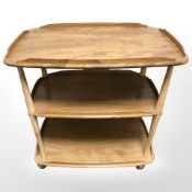 An Ercol three tier drinks trolley, width 70 cm.