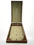 A large 19th century folding mahogany tabletop bagatelle, overall length 274 cm.