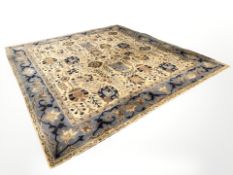 A machined Persian-style carpet, 365 cm x 337 cm.